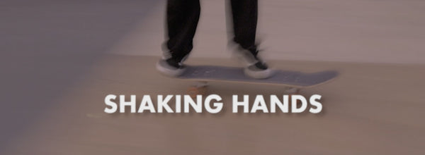 SHAKING HANDS
